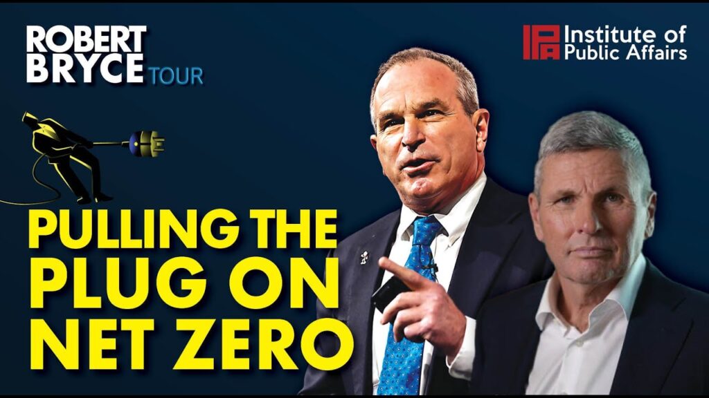Man in business suit speaking at podium during Institute of Public Affairs net zero energy presentation